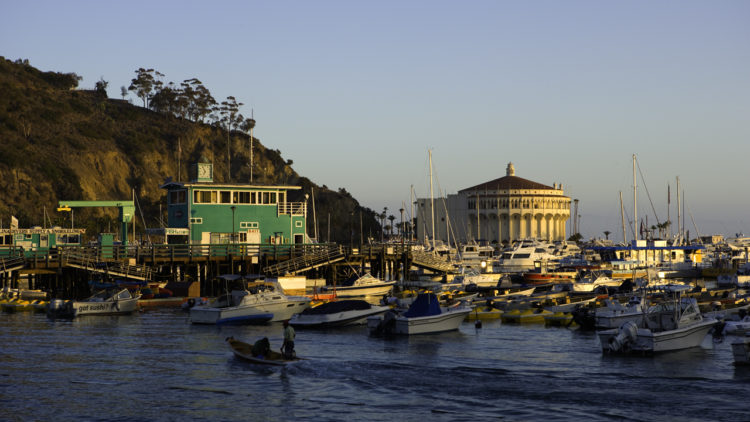 a boat is docked in a harbor