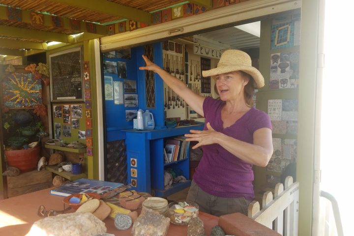 a woman preparing food on a table