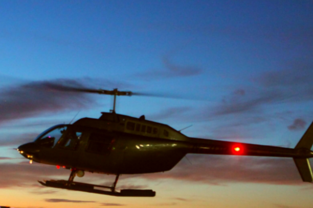 a fighter jet sitting on top of a runway