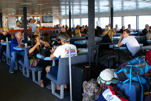 a group of people sitting at a table in a room