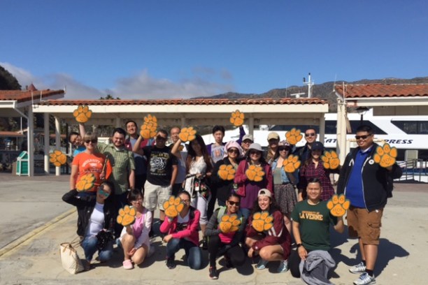 a group of people posing for the camera