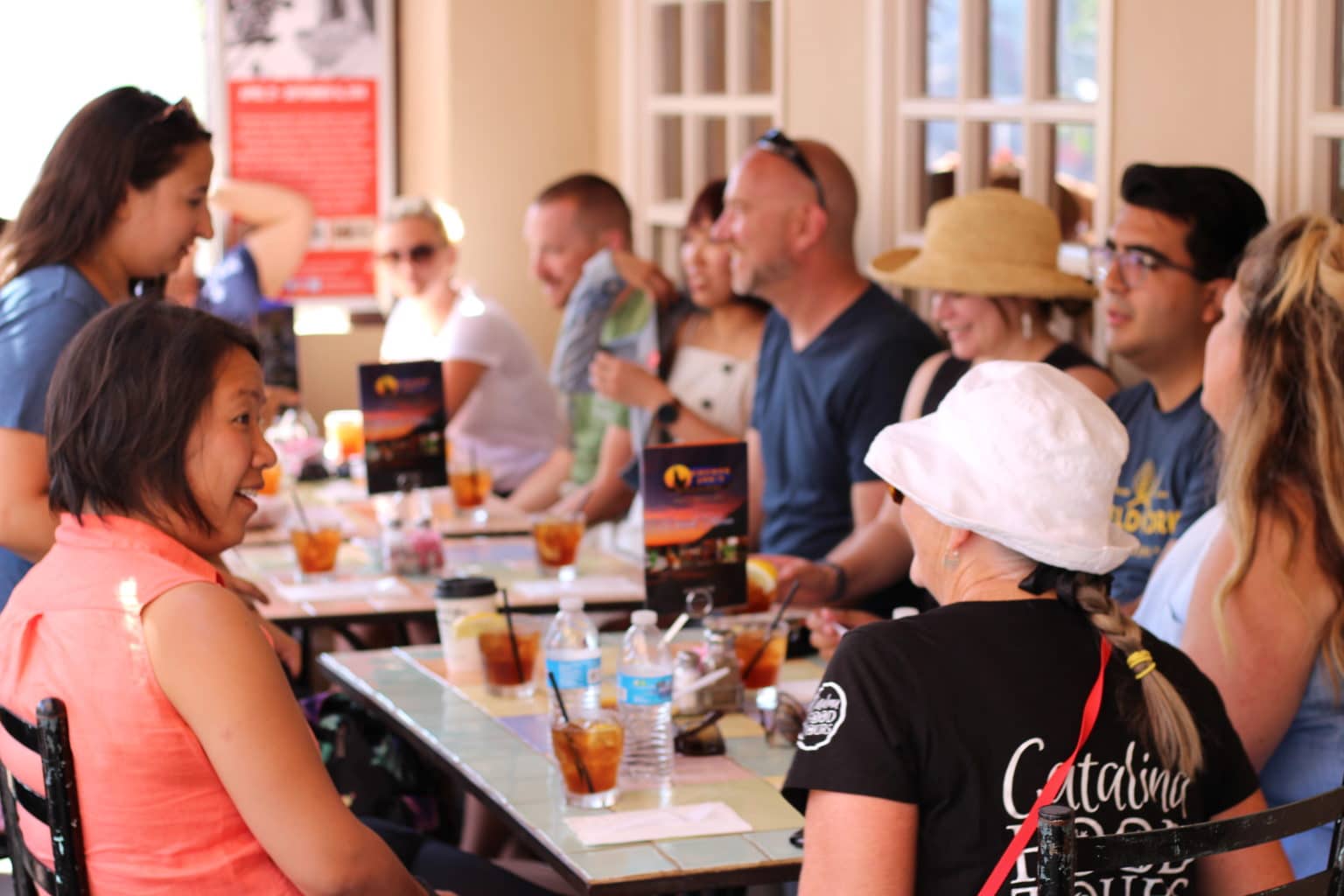 a group of people sitting at a table
