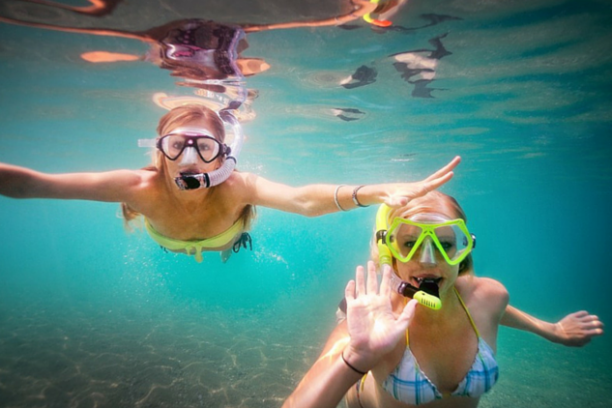 a person swimming in a pool of water