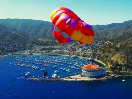 a parachute with a body of water
