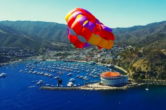 a parachute with a body of water