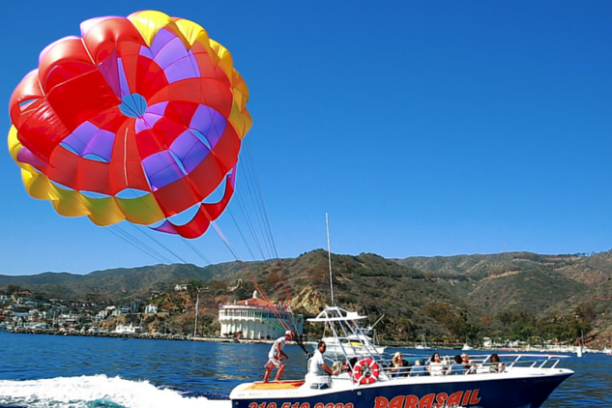 a colorful kite in a boat on the water