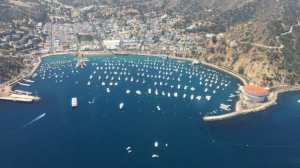 a body of water with a mountain in the background