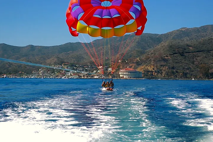 a parachute with a body of water