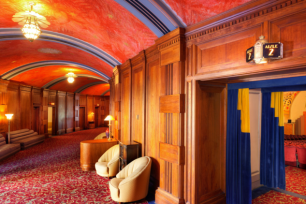 a room filled with furniture and a large window