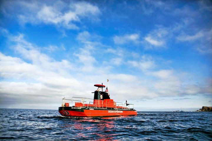 a small boat in a body of water