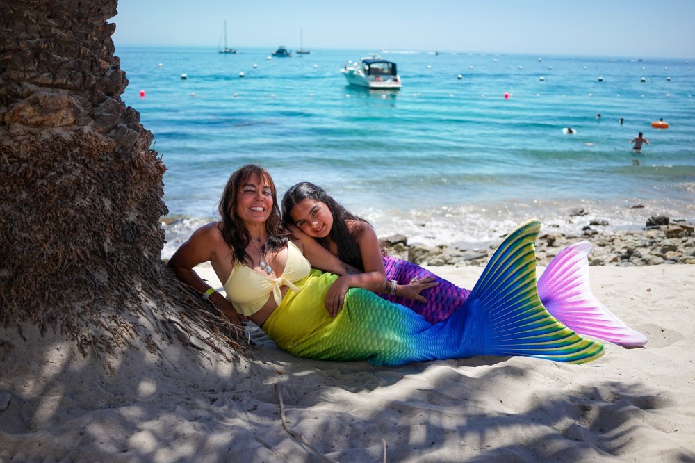 a person sitting at a beach