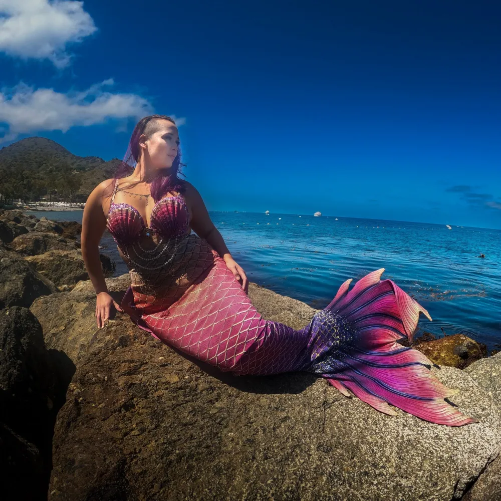 a person sitting at a beach
