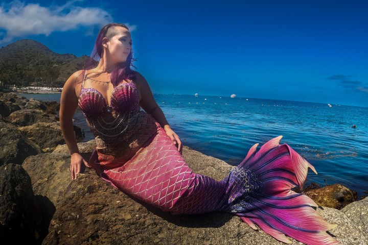 a person sitting at a beach